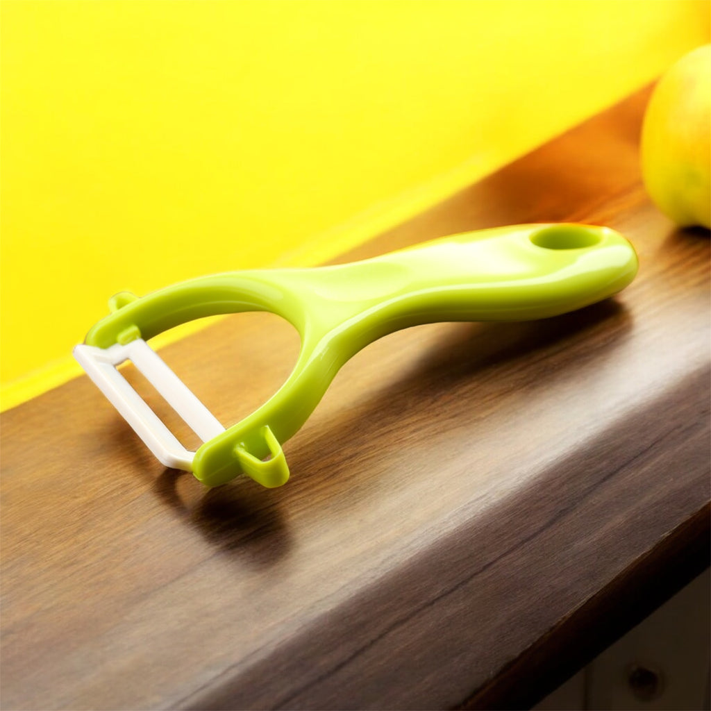 Pelaverdure con Lama in Ceramica